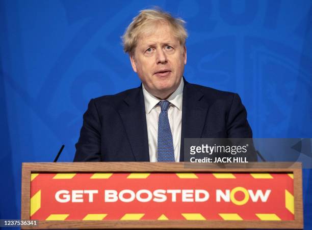 Britain's Prime Minister Boris Johnson hosts a virtual press conference to update the nation on the status of the Covid-19 pandemic, in the Downing...
