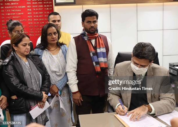 Aam Aadmi Candidate candidates Anju katyal , Prem lata and Ram Chander yadav file nomination at Municipal Corporation Office on January 4, 2022 in...