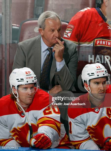 Head coach Darryl Sutter of the Calgary Flames looks on during first period action against the Florida Panthers at the FLA Live Arena on January 4,...