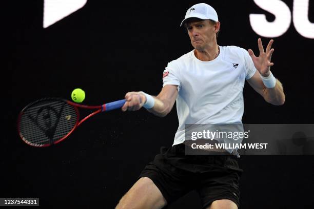 Kevin Anderson of South Africa hits a return during his men's singles match against Jaume Munar of Spain at the Melbourne Summer Set tennis...