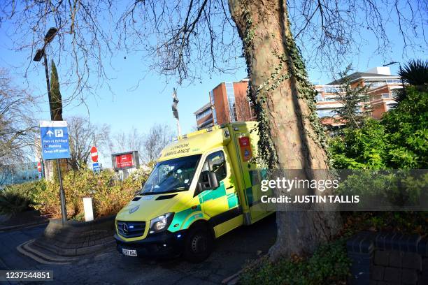 Ambulances are pictured at St George's Hospital in Tooting, south London on January 5, 2022. - Britain's state-run National Health Service is...