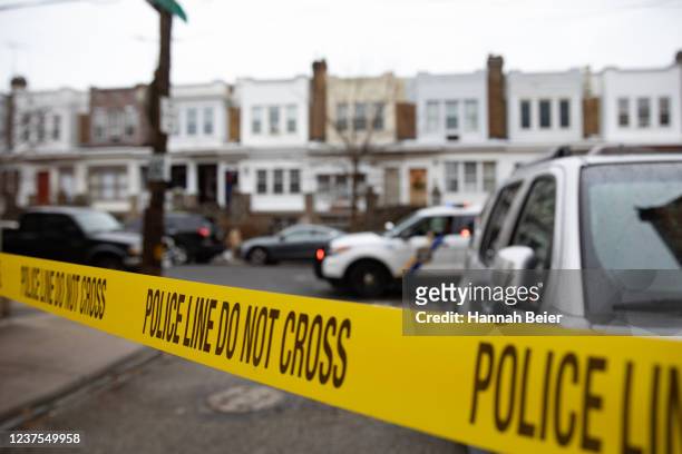 Police tape is pictured near the scene of the fatal fire in the Fairmount neighborhood on January 5, 2022 in Philadelphia, Pennsylvania. A fire...