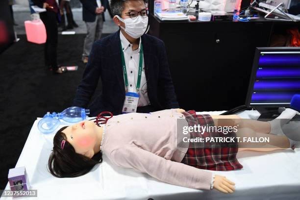 Yusuke Ishii speaks about the tmsuk Pedia-Roid ER training robot for healthcare worker training on pediatric patients as it is demonstrated during...