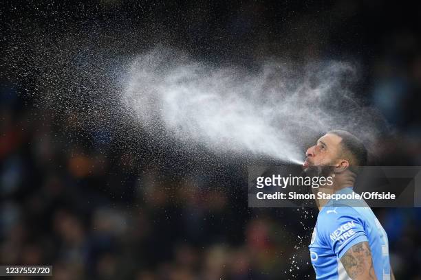 Kyle Walker of Manchester City spits water out during the UEFA Champions League group A match between Manchester City and Paris Saint-Germain at...