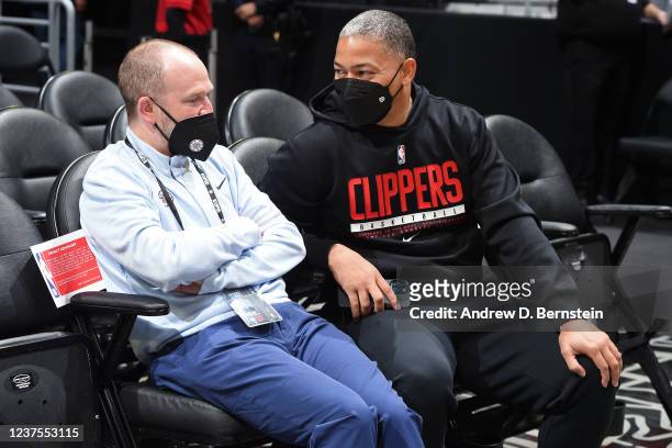 Head Coach Tyronn Lue of the LA Clippers talks to President of Basketball Operations, Lawrence Frank of the LA Clippers before the game against the...