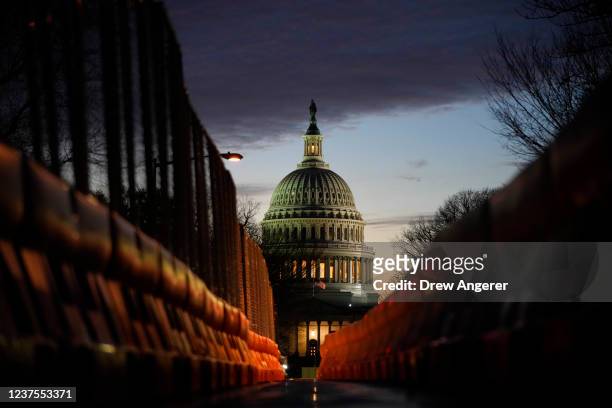 View of the U.S. Capitol down East Capitol Street at sunset on January 5, 2022 in Washington, DC. Congress is preparing to mark the one year...
