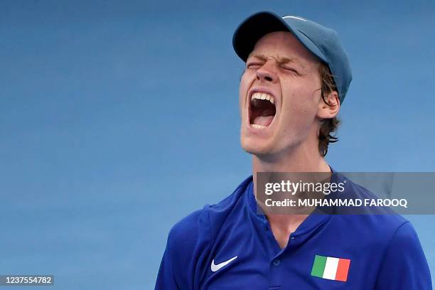 Jannik Sinner of Italy celebrates after winning against Roman Safiullin of Russia during their Group B men's singles tennis match at the 2022 ATP Cup...