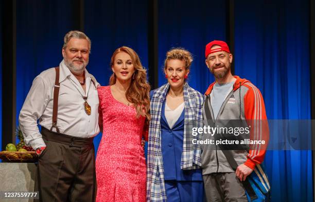 January 2022, Berlin: Torsten Münchow , Caroline Beil, Alessija Lause, citizen Lars Dietrich stand on stage during the photo rehearsal of the play...