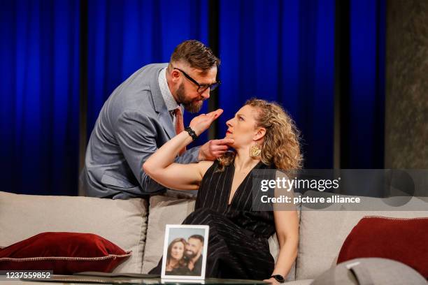 January 2022, Berlin: Alessija Lause and citizen Lars Dietrich stand on stage during the photo rehearsal of the play "Rent a Friend" at the...