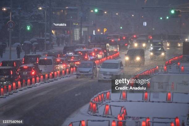 View of the traffic road in Tokyo Shinjuku ward, Japan on January 6 as first snowflakes are seen in Tokyo, Japan in early winter of the new year.