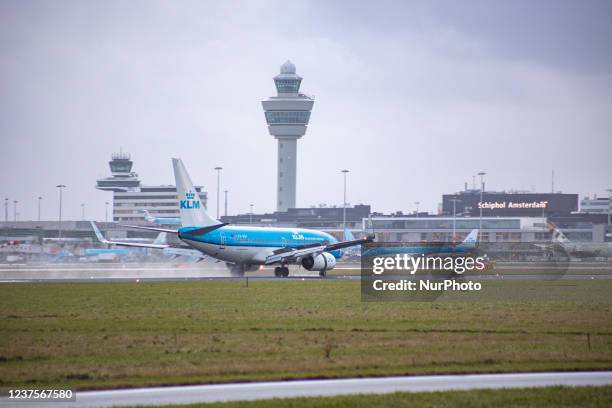 Royal Dutch Airlines Boeing 737-700 aircraft as seen landing at Amsterdam Schiphol Airport. The airplane has the registration PH-BGF and the name...