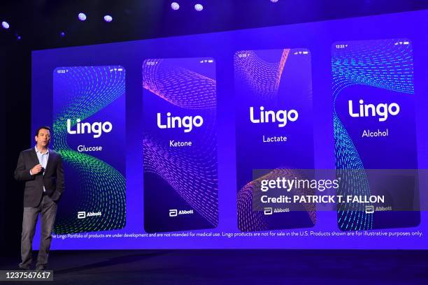 Robert Ford, chairman and chief executive officer of Abbott Laboratories, unveils a portfolio of Lingo biosensors for health monitoring during the...