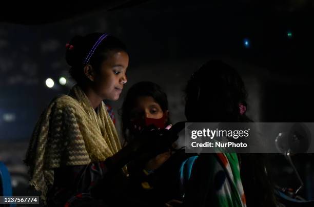 Teenage girl browses mobile phone amid coronavirus emergency in Kolkata, India, 06 January, 2022. Excessive use of mobile phones by school-going kids...