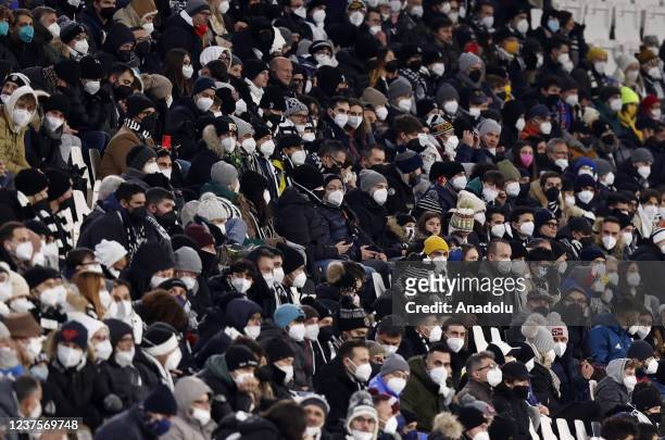 Juventus fans wear protective masks during the Serie A football match between Juventus and Napoli at Allianz Stadium in Turin, Italy, on January 06,...