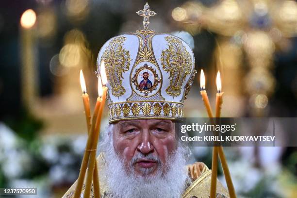 Russian Patriarch Kirill celebrates a Christmas service at the Christ the Savior cathedral in Moscow, late on January 6, 2022. - Orthodox Christians...