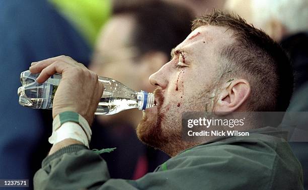 Trevor Brennan of Ireland takes on some refreshments after he was substituted during the World Cup Pool E match between Ireland and Australia played...