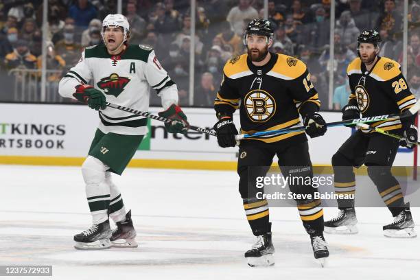 Marcus Foligno of the Minnesota Wild skates against his brother Nick Foligno of against Boston Bruins at the TD Garden on January 6, 2022 in Boston,...