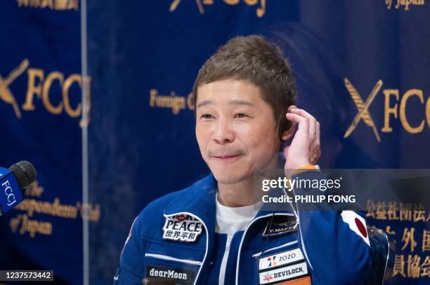 Japanese billionaire Yusaku Maezawa, who went to the International Space Station last month as a "space tourist", attends a press conference at the...