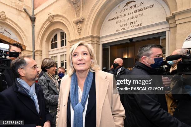 French far-right party Rassemblement National party presidential candidate Marine Le Pen, flanked by far-right mayor of Beziers Robert Menard ,...