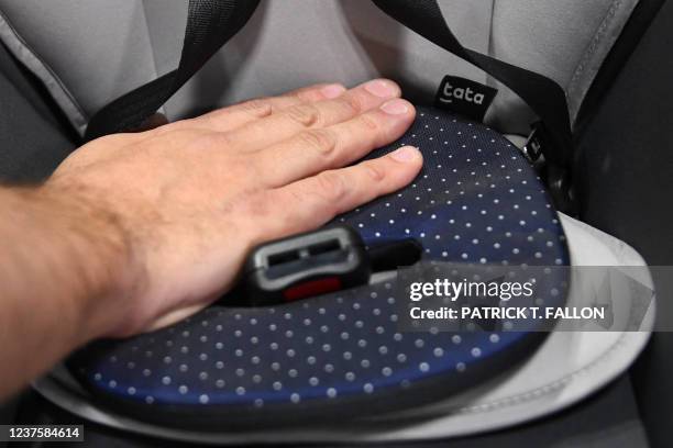 The Tata Pad by Filo, a smart baby car seat alarm to alert when a child is left in a vehicle, is demonstrated during the Consumer Electronics Show on...