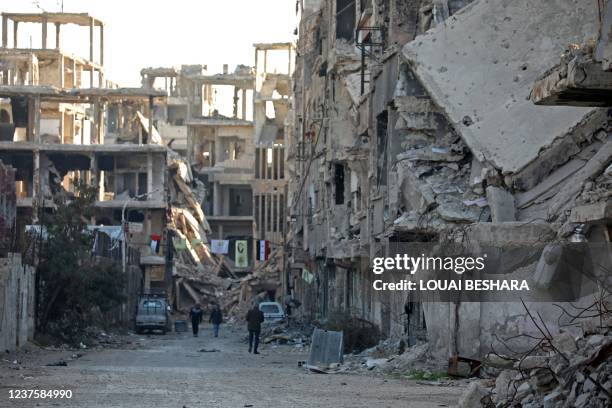 General view shows the ravaged Yarmouk camp, south of Syria's capital Damascus, during celebrations marking the 57th anniversary of Fatah movement's...