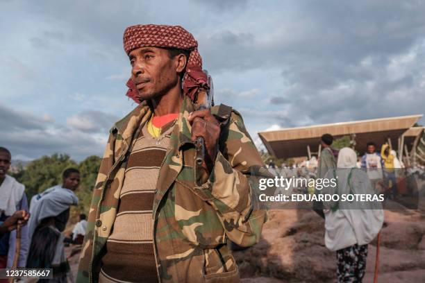 Pilgrims walk in one of the pilgrims camp sites during the eve of the celebration of Genna, the Ethiopian Orthodox Christmas, in Lalibela, home to a...