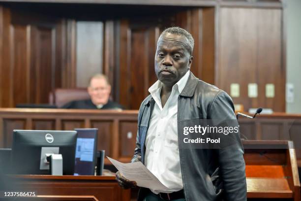 Ahmaud Arbery's father Marcus Arbery's leaves the podium after giving his impact statement to Superior Court Judge Timothy Walmsley during the...