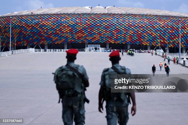 Cameroonian soldiers patrol at the entrance of the Olembe stadium in Yaounde, on January 7, 2022 two days before the start of The African Cup of...