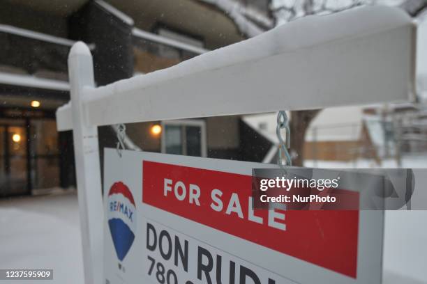 For Sale sign seen outside a house in the center of Edmonton. On Friday, January 7 in Edmonton, Alberta, Canada.