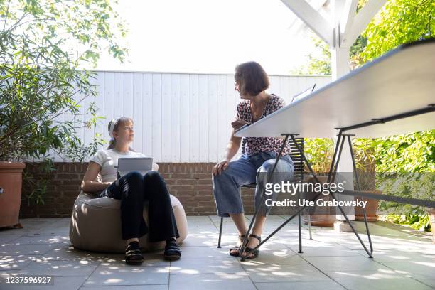 In this photo illustration two persons are working in a winter garden on May 31, 2021 in Duelmen, Germany.