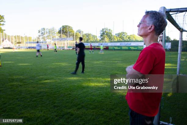 In this photo illustration a coach or a teacher is standing next to the playground on May 31, 2021 in Duelmen, Germany.