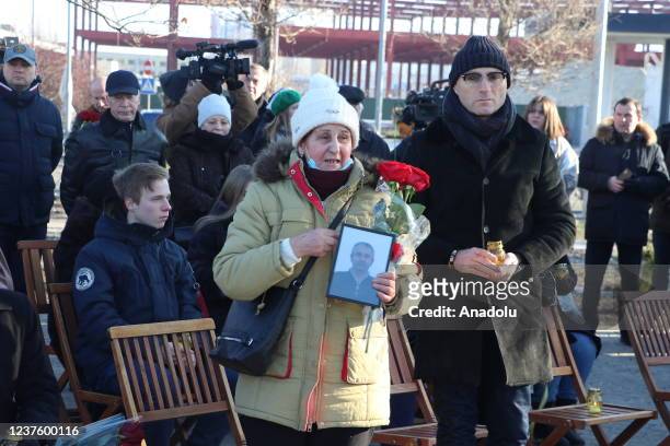 Relatives lay flowers to the monument to mark the victims of Flight 752 of Ukraine International Airlines which was shot by Iranian missile on...