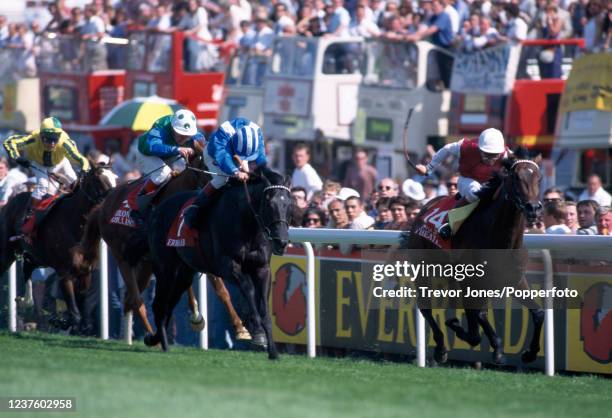 Scottish jockey Willie Carson riding Erhaab winning the Derby at Epsom, 1st June 1994. Placed second Irish jockey Mick Kinane riding King's Theatre ,...