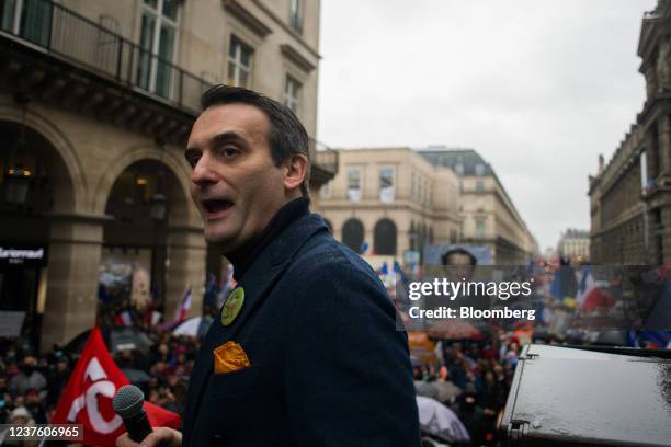 Florian Philippot, leader of Les Patriotes , a nationalist party, speaks to demonstrators during a protest against vaccination pass rules and...