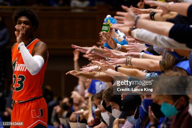 Cameron Crazies and fans of the Duke Blue Devils try to distract Kameron McGusty of the Miami Hurricanes in the second half at Cameron Indoor Stadium...