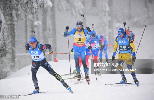 Germany's Erik Lesser, France's Emilien Jacquelin and Sweden's Sebastian Samuelsson compete during the men's 12.5km pursuit event at the IBU Biathlon...