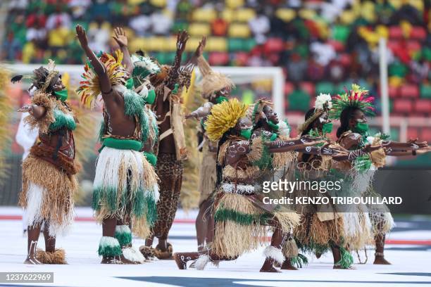 Dancers perform during the opening ceremony of the Africa Cup of Nations 2021 football tournament at Stade d'Olembé in Yaounde on January 9, 2022.