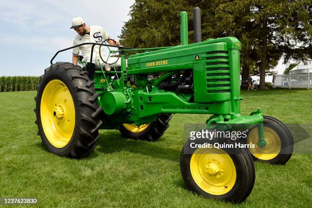 Lucas Giolito of the Chicago White Sox sits on a John Deere tractor prior to the game between the New York Yankees and the Chicago White Sox at MLB...