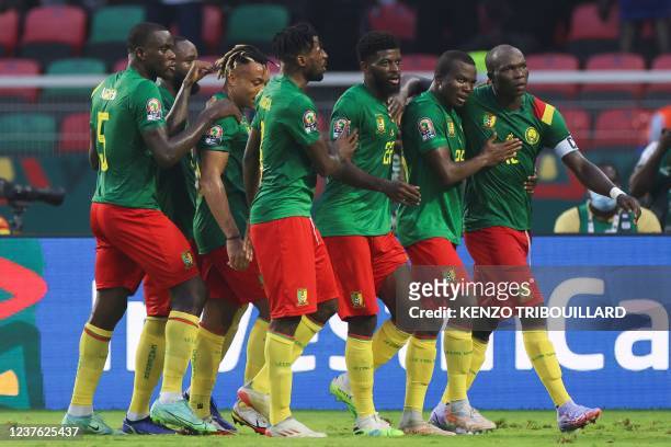 Cameroon's forward Vincent Aboubakar celebrate with teammates after scoring his team's second goal during the Group A Africa Cup of Nations 2021...