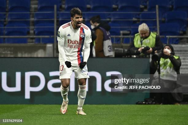 Lyon's Brazilian midfielder Lucas Paqueta celebrates after scoring his team's first goal during the French L1 football match between Olympique...