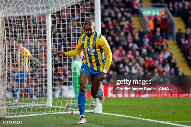 Dan Udoh of Shrewsbury Town celebrates after scoring a goal to make it 0-1 during the Emirates FA Cup Third Round match between Liverpool and...