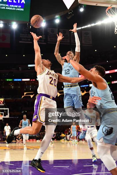 Ja Morant of the Memphis Grizzlies blocks Avery Bradley of the Los Angeles Lakers on January 9, 2022 at Crypto.Com Arena in Los Angeles, California....