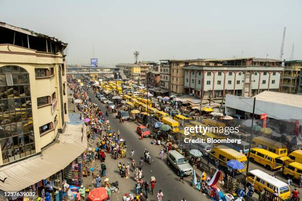 Taxi vans in heavy traffic on Nnamdi Azikwe Street by Idumota market in Lagos, Nigeria, on Thursday, Jan. 6, 2022. Nigerias Lagos state government...