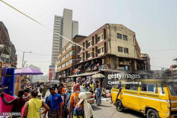 Vendors line the street at Idumota market in Lagos, Nigeria, on Thursday, Jan. 6, 2022. Nigerias Lagos state government plans to build new roads,...