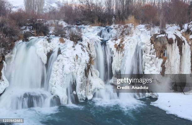 View of partly frozen Muradiye Waterfall which attracts the attention of thousands of local and foreign visitors every season in Van, Turkiye on...