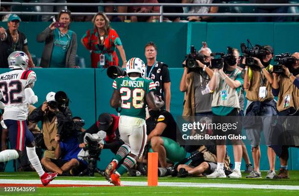Miami Gardens, FL Miami Dolphins running back Duke Johnson is untouched as he walks into the end zone with a touchdown during the third quarter. The...