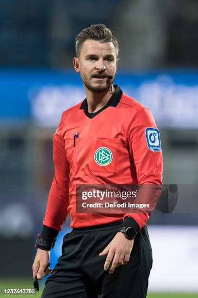 Referee Daniel Schlager looks on during the Bundesliga match between VfL Bochum and VfL Wolfsburg at Vonovia Ruhrstadion on January 9, 2022 in...