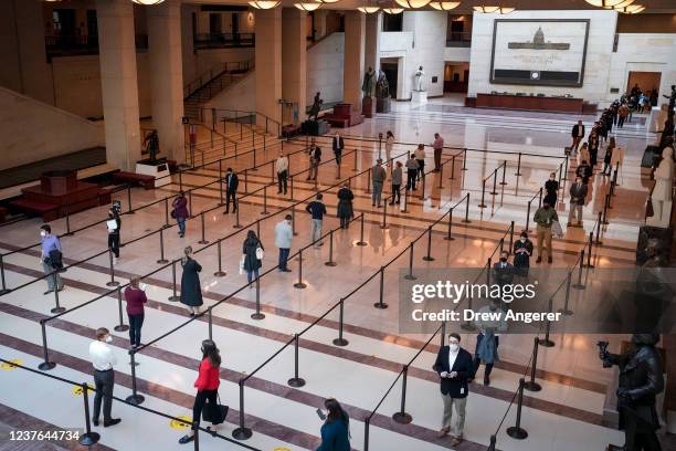 People wait in line to get a COVID-19 test at the U.S. Capitol on January 10, 2022 in Washington, DC. According to a recent letter from the D.C....