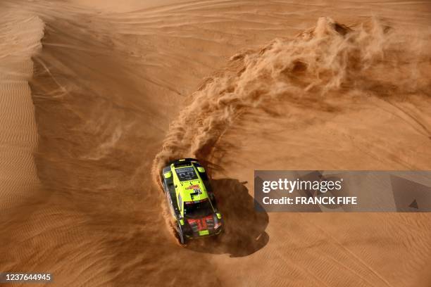 Lithuanian driver Brian Baragwanath and co-driver Leonard Cremer of South Africa compete during the Stage 8 of the Dakar Rally 2022 between...