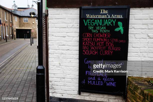 Sign outside a pub advertises a special Veganuary menu on 10th January 2022 in Eton, United Kingdom. Two million people have now signed the Veganuary...